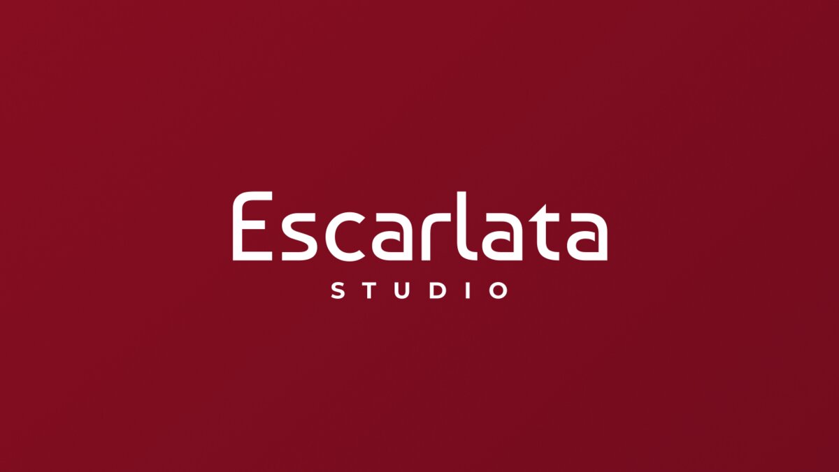 Logo de Escarlata Studio en blanco sobre un fondo rojo
